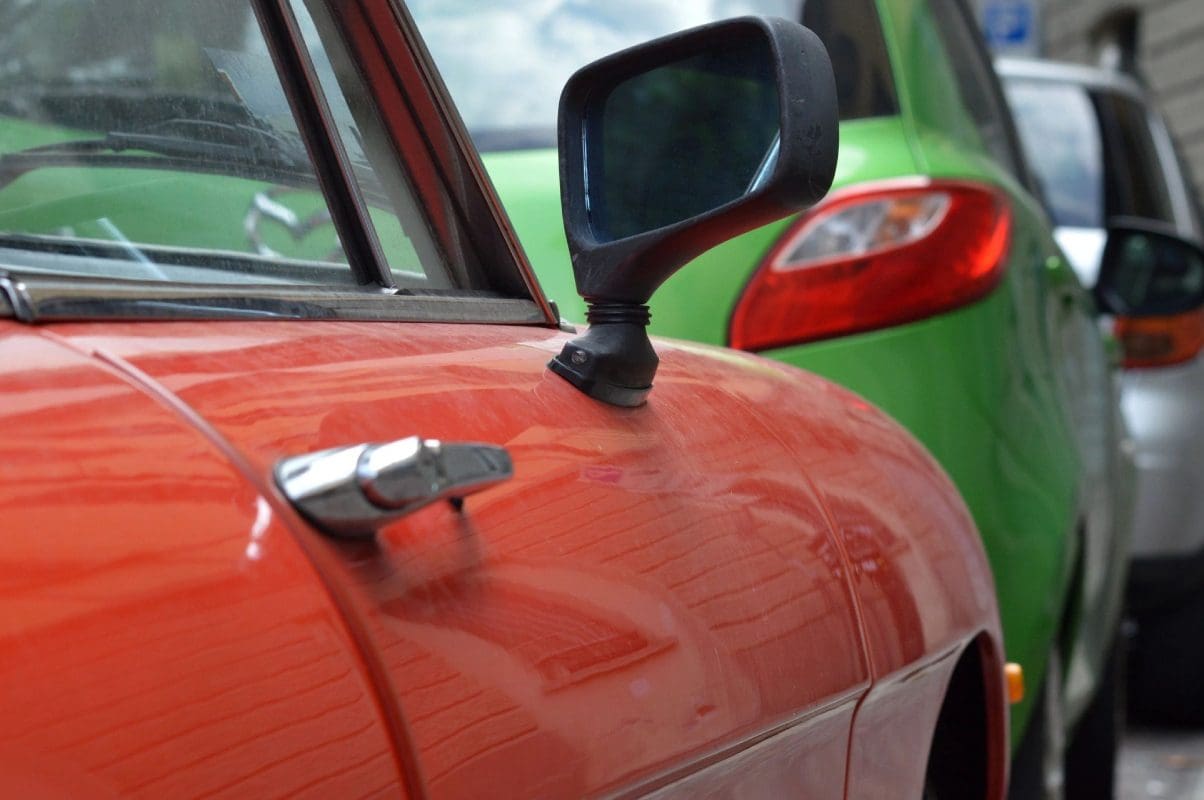 A close up of the side mirror on a car